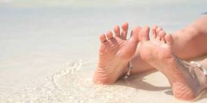 A pair of feet in the water