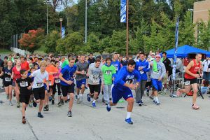 Runners get started on the Cabrini 5K.