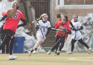Senior Erin McLaughlin scooped five ground balls in Tuesday's loss against Haverford.  (John Howard/Staff Photographer)
