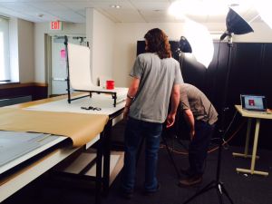 Students work on photos for exhibition (Photo: Bri Morrell)