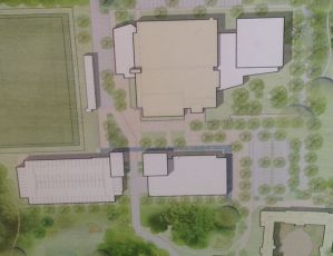 A picture of the plans to expand the Dixon Center. The white spaces are the new additions, the beige building is the current Dixon Center. Photo Credit: Mackenzie Harris / Asst. News Editor