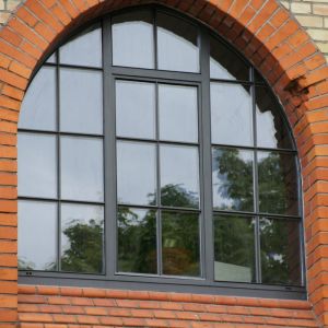 traditional steel window with arched head