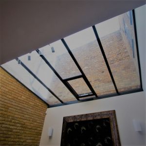 steel framed glass roof with integrated vent 