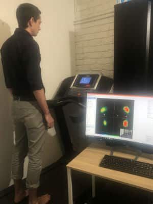 A patient being assessed on the diagnostic treadmill
