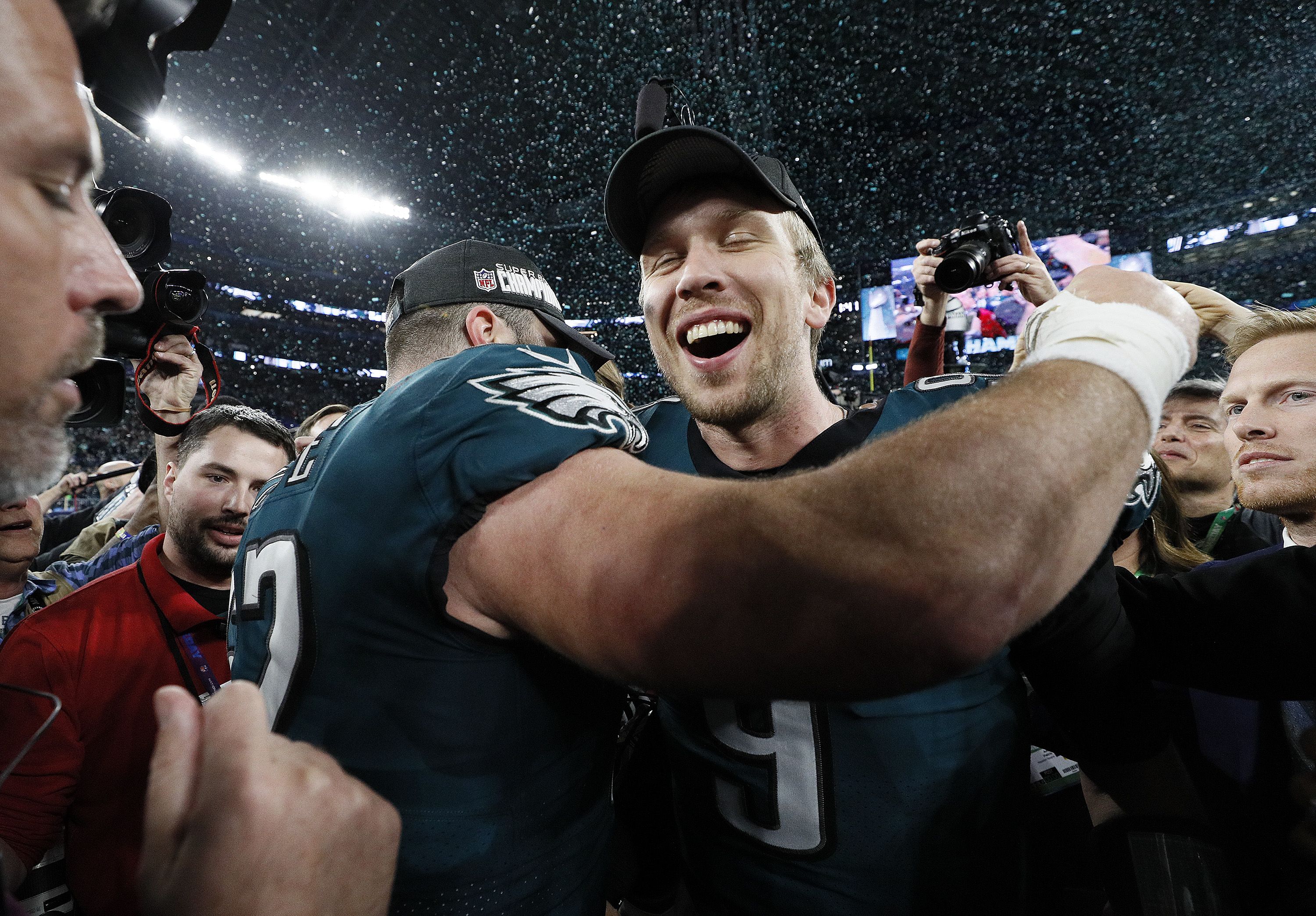 Philadelphia Eagles quarterback Nick Foles (9) joins teammates in celebrating their victory over the New England Patriots in Super Bowl LII. Photo by Carlos Gonzalez of the Minneapolis Star Tribune.