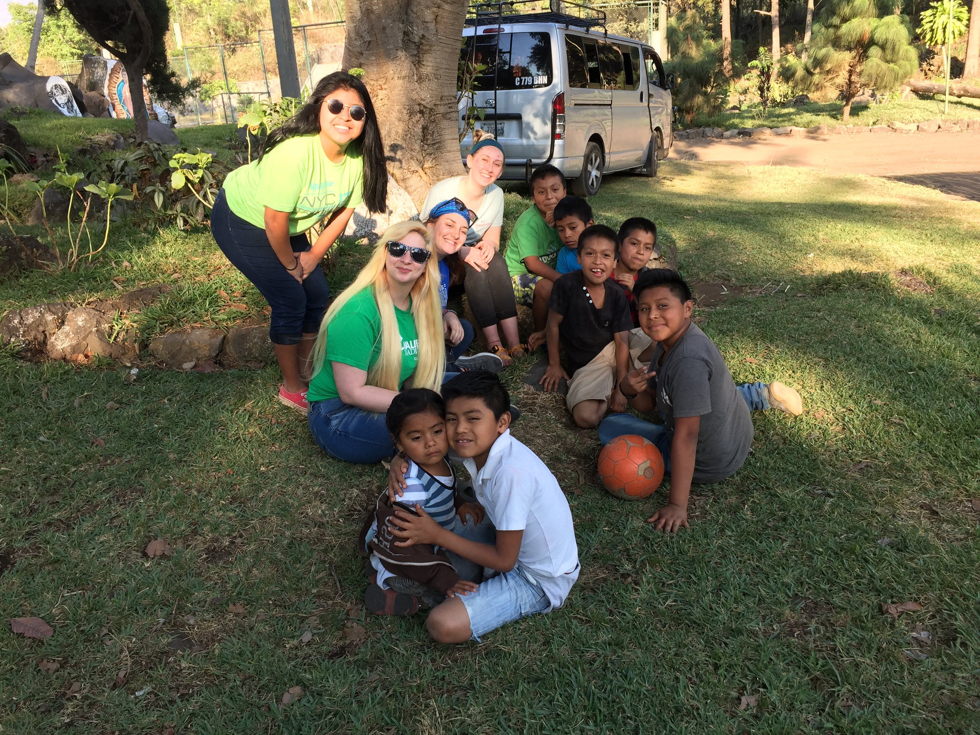 Cabrini students hang out with a group of Guatemalan youth. Photo by Raquel Green.