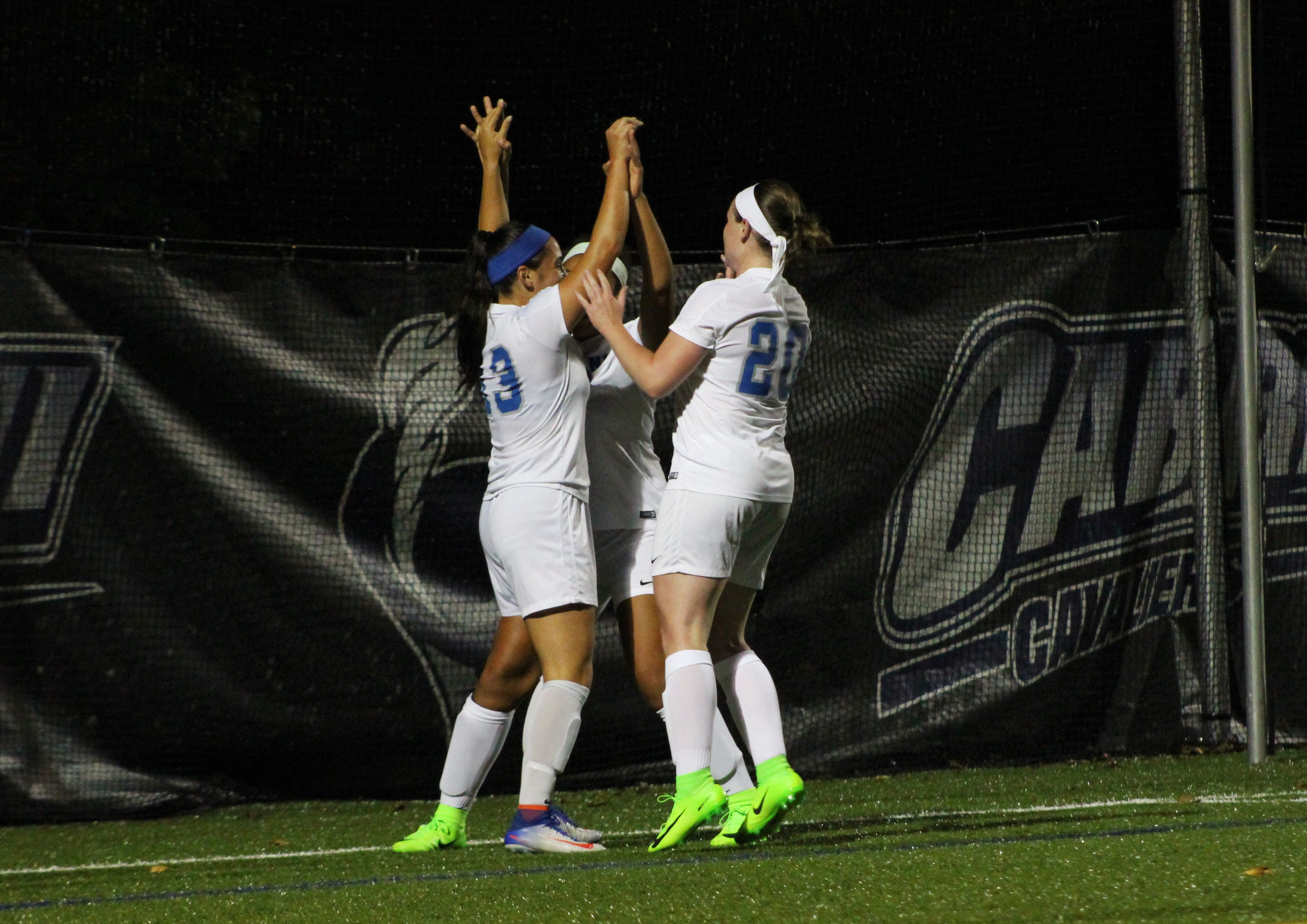 Cavaliers celebrate after scoring a goal. Photo by Michelle Guerin