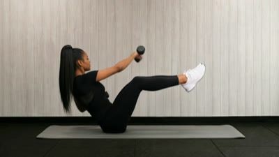 Dumbbell V-Sit Cross Jab