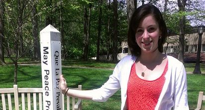 Cathy Matta, class of 2013 valedictorian, poses proudly at one of her favorite places on campus.