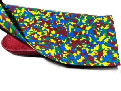 A red custom orthotic having a cover applied