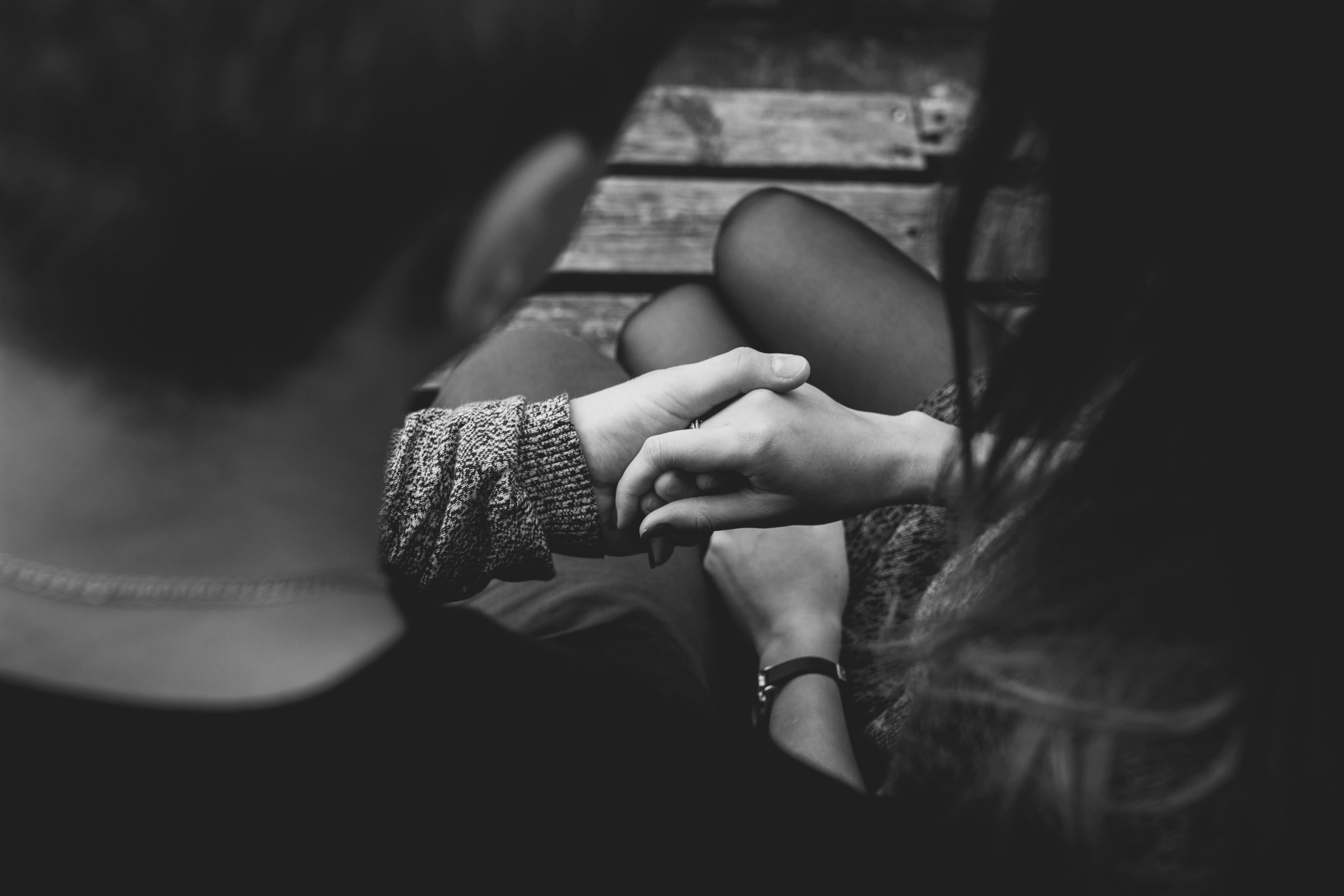 This is a picture of a couple holding hands. 
Photo Credits are by Pexels.com