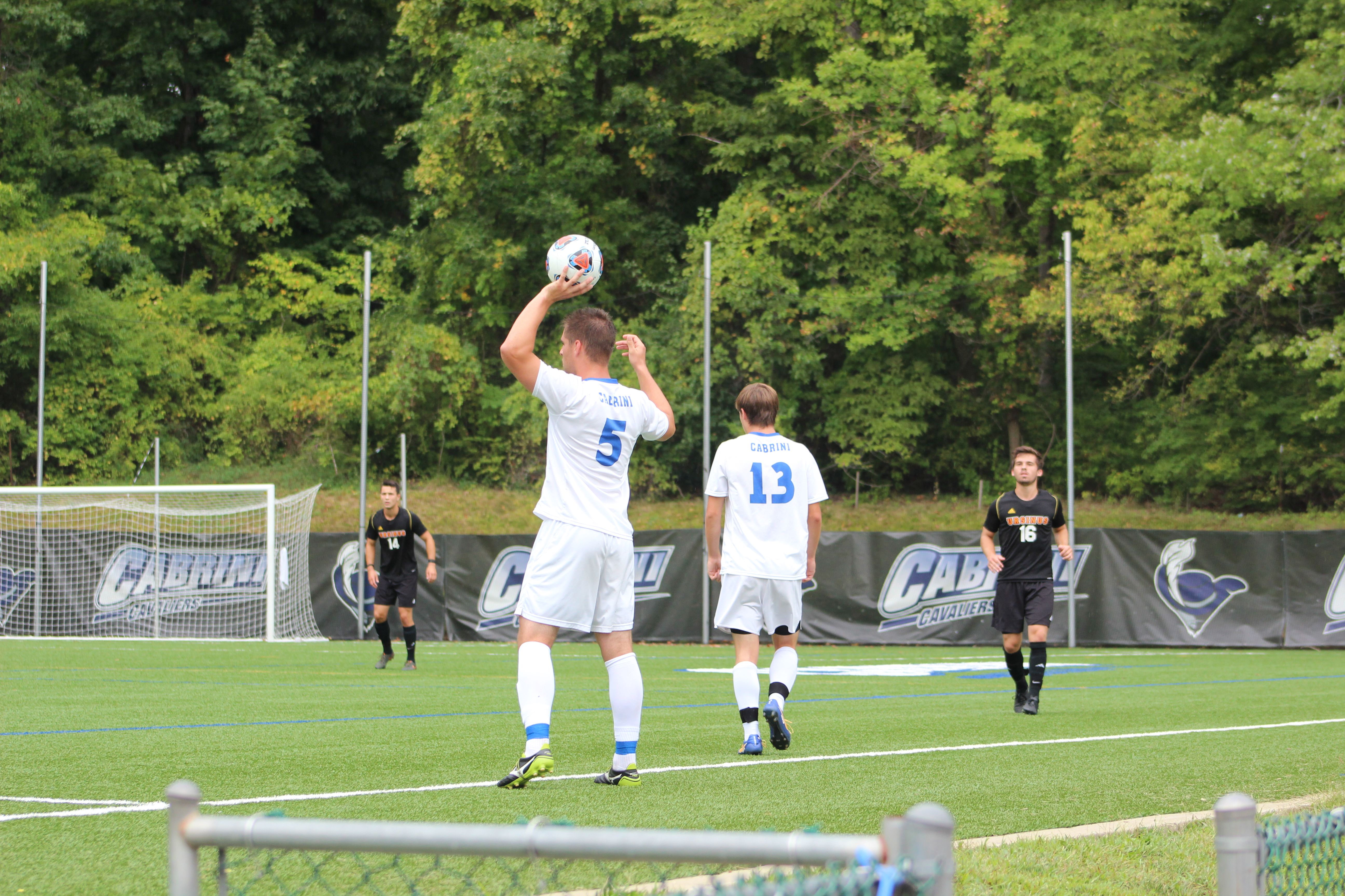 Cabrini men's soccer player John Underwood taking a throw in. (Photo by Jordan Clouthier / Photo for Pub)