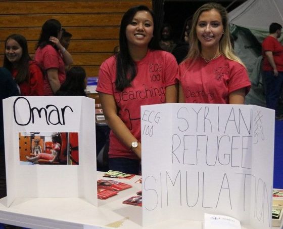 Michelle Guerin (left) and ? (right) presenting their project about Syrian refugees.