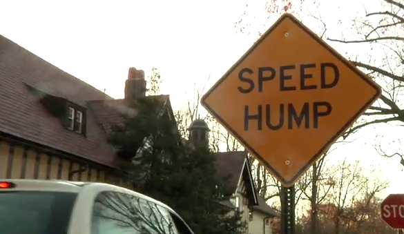 Speed hump warning by Grace Hall