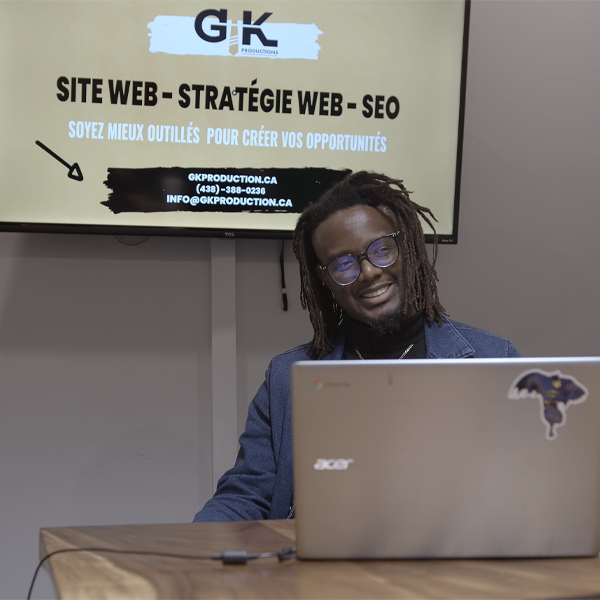 Man doing a presentation about web laughing to someone