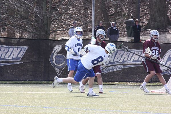 Bobby Thorp (No. 8) scored five goals in the Cavaliers’ 15-7 win over Swarthmore College on Saturday, March 9. The win improved the Cavs to 2-2 on the season. (Kevin Durso / Sports Editor)