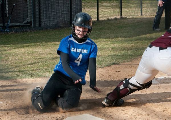 Lindsey Atzery (No. 4) went 2-3 in a loss in the second game of the double header. Cabrini was swept by Widner University, 6-0 the first game and 12-3. (Cabrini Athletics/Submitted Photo)