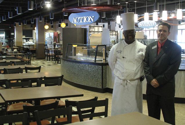 Rodney Stockett and Drew Niemann stand in the newly remodeled Marketplace. 