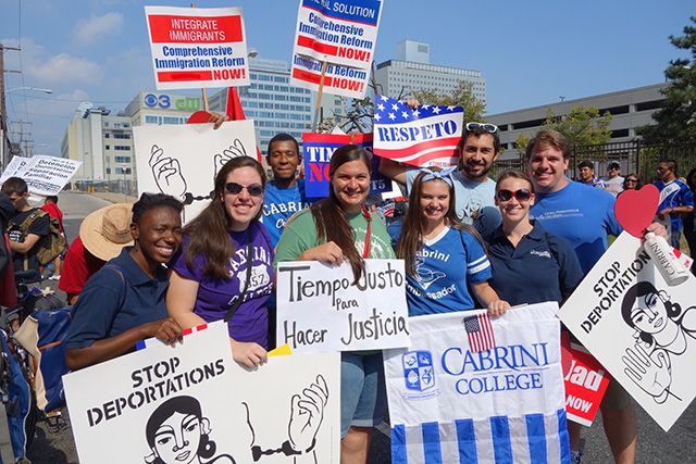 Students and staff members from Cabrini College gather in Philadelphia to join the Rally for Immigrant Dignity, Repsect and Family Unity in Philadelphia