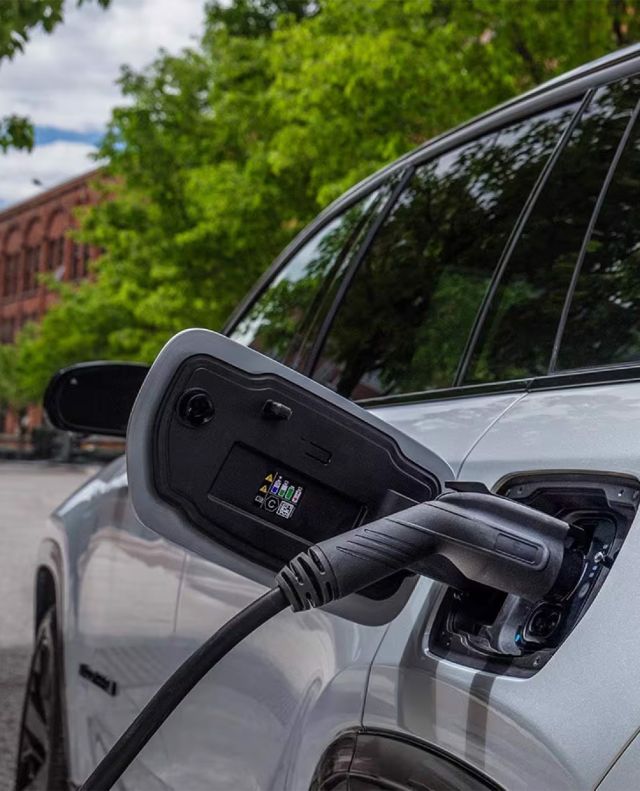 2024 Electric Jeep Wagoneer S at Delaney CDJR of DuBois | Close up of the charging port of a 2024 Jeep Wagoneer S