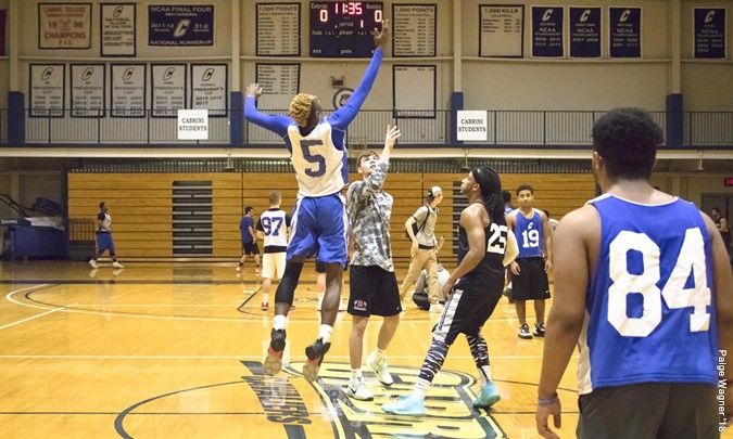 Players in action during the 2018 intramural basketball league. Photo from Cabrinirec.