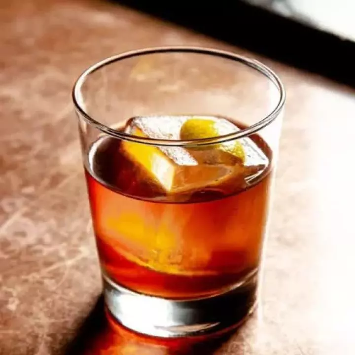 Reverend Palmer (Black tea-infused bourbon, lemon syrup)