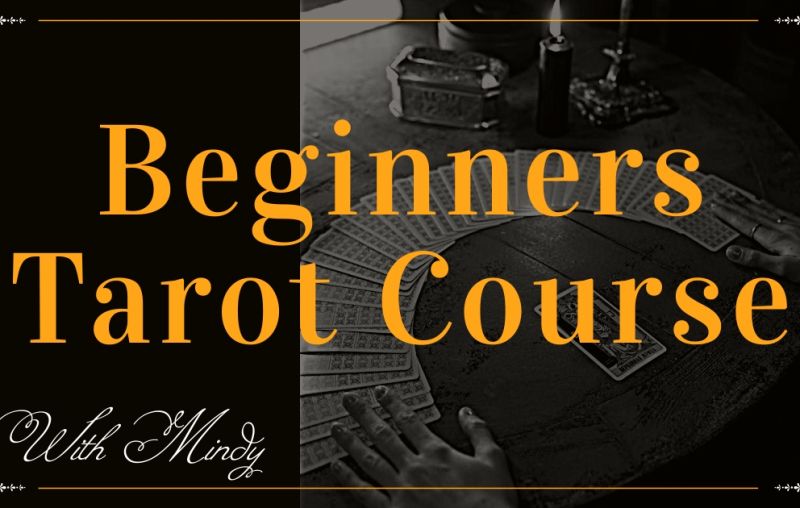 Beginners Tarot Course 1 a hand on a deck of cards