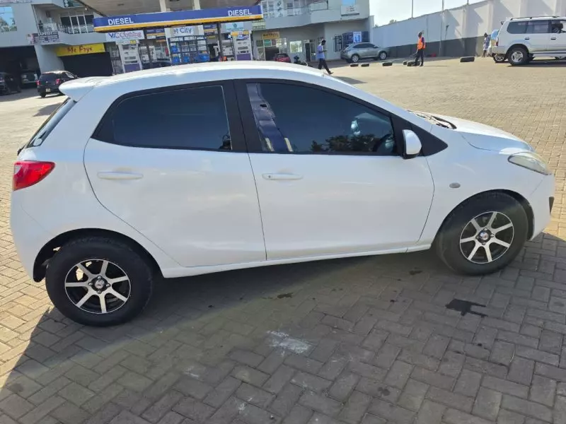 Mazda Demio   - 2012