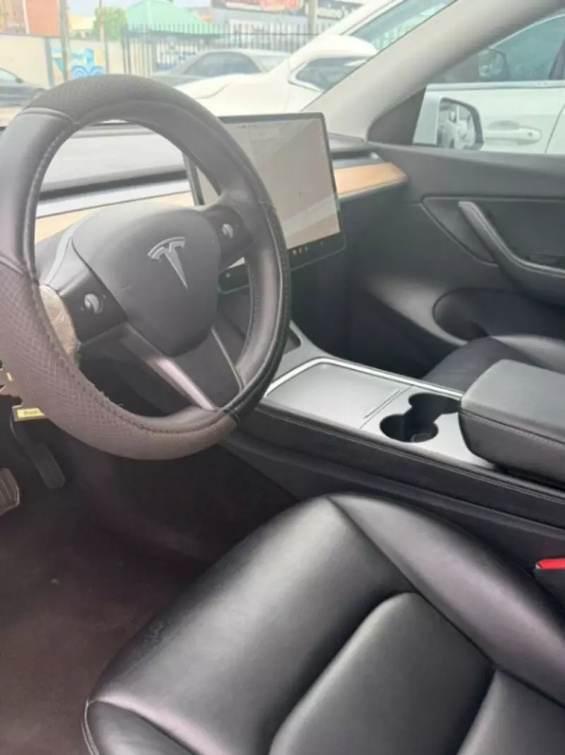Tesla Model Y   - 2021