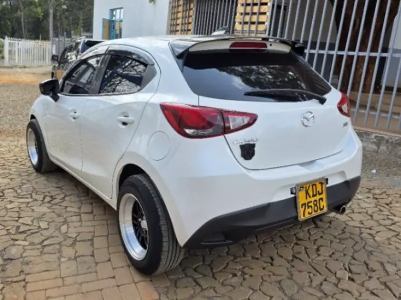 Mazda Demio   - 2015