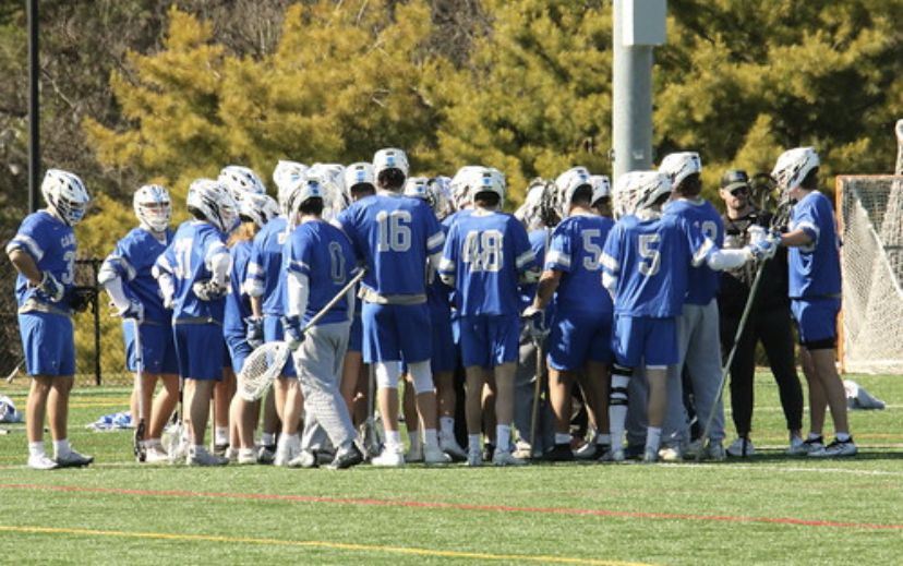 The team gathering after one of Haverford's early timeouts. Photo by Robert Ditrolio.